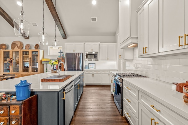 14344 Walsh Ave, Fort Worth, TX 76008 - kitchen with appliances with stainless steel finishes, white cabinetry, light countertops, dark wood finished floors, and decorative backsplash