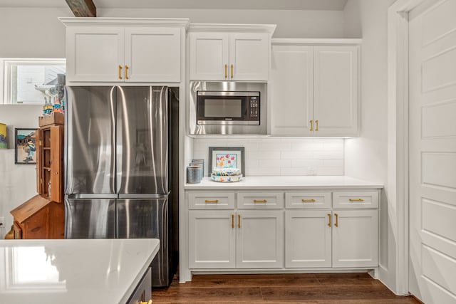 14344 Walsh Ave, Fort Worth, TX 76008 - kitchen with appliances with stainless steel finishes, light countertops, tasteful backsplash, and white cabinets