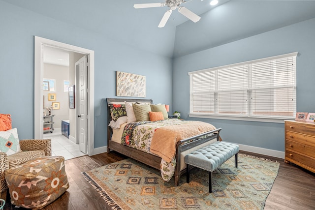 14344 Walsh Ave, Fort Worth, TX 76008 - bedroom featuring baseboards, wood finished floors, ceiling fan, ensuite bathroom, and vaulted ceiling