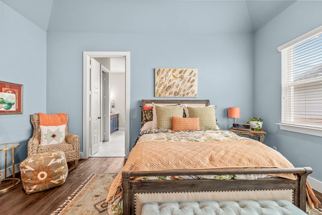 14344 Walsh Ave, Fort Worth, TX 76008 - bedroom with wood finished floors, vaulted ceiling, ensuite bathroom, and baseboards