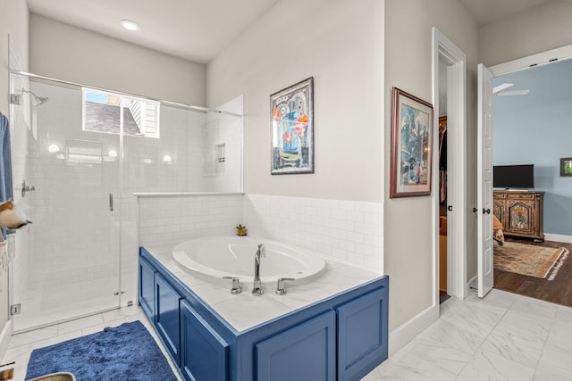 14344 Walsh Ave, Fort Worth, TX 76008 - bathroom featuring a shower stall, baseboards, a garden tub, and marble look tiles