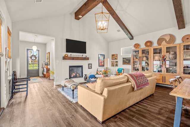 14344 Walsh Ave, Fort Worth, TX 76008 - living area with a chandelier, high vaulted ceiling, wood finished floors, beamed ceiling, and a warm lit fireplace