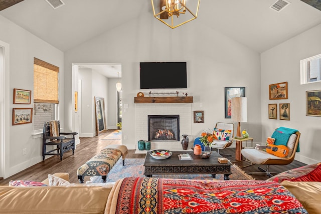 14344 Walsh Ave, Fort Worth, TX 76008 - living room with high vaulted ceiling, a chandelier, a fireplace, wood finished floors, and baseboards