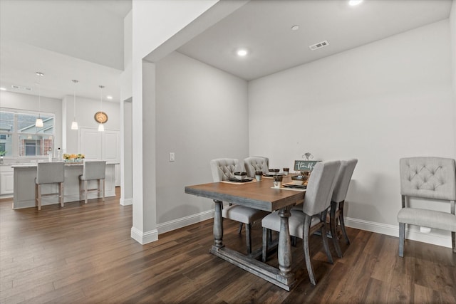 office featuring dark wood-style flooring, baseboards, and recessed lighting