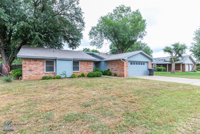 3242 Whitewing Way, Abilene, TX 79606 - single story home with brick siding, an attached garage, and driveway