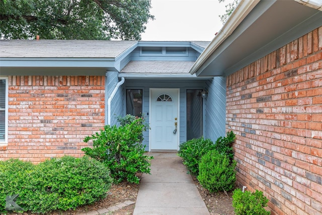 3242 Whitewing Way, Abilene, TX 79606 - property entrance with brick siding and a shingled roof