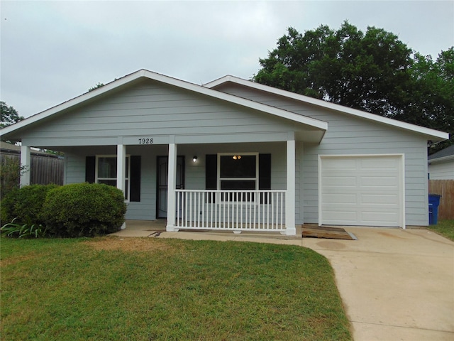 7928 Hull Ave, Dallas, TX 75216 - view of front of property featuring a porch, concrete driveway, a garage, and a front lawn