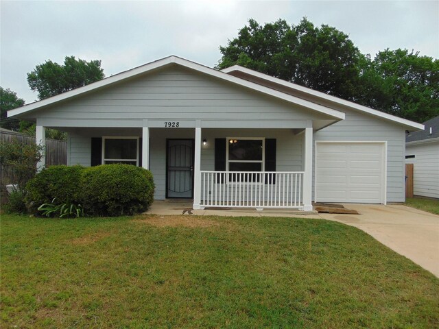 7928 Hull Ave, Dallas, TX 75216 - view of front facade with covered porch, concrete driveway, a garage, and a front lawn