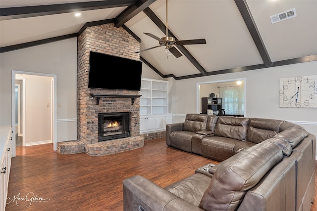 102 Pinehurst Pl, Benton, LA 71006 - living room featuring a ceiling fan, beam ceiling, wood finished floors, a fireplace, and high vaulted ceiling