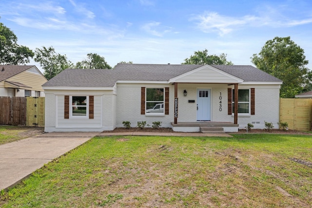 10430 Wood Dale Dr, Dallas, TX 75228 - single story home with brick siding, a gate, a porch, and roof with shingles