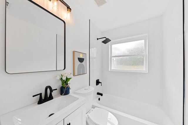 10430 Wood Dale Dr, Dallas, TX 75228 - bathroom with bathtub / shower combination, toilet, and vanity