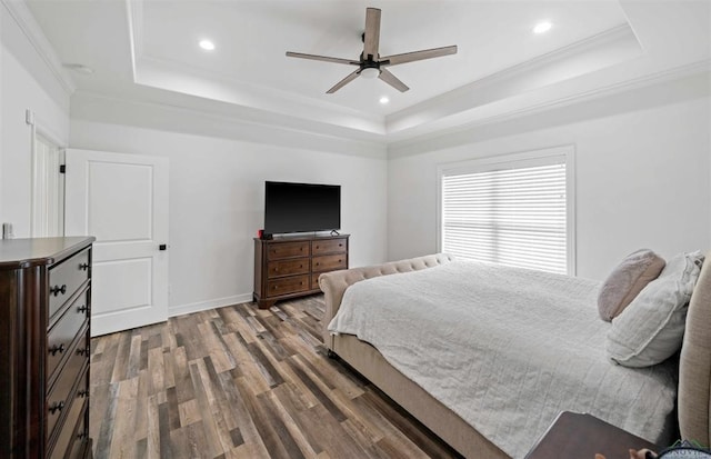 316 Heritage Way, Bullard, TX 75757 - bedroom with a raised ceiling, wood finished floors, crown molding, recessed lighting, and a ceiling fan