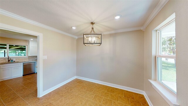 3201 Lakeland St, Fort Worth, TX 76111 - unfurnished dining area with a chandelier, plenty of natural light, crown molding, a sink, and baseboards