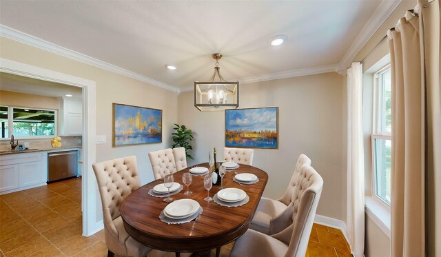 3201 Lakeland St, Fort Worth, TX 76111 - dining area with light tile patterned flooring, a chandelier, crown molding, recessed lighting, and baseboards
