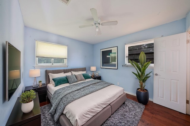 8820 Easley St, White Settlement, TX 76108 - bedroom featuring wood finished floors, a ceiling fan, and baseboards