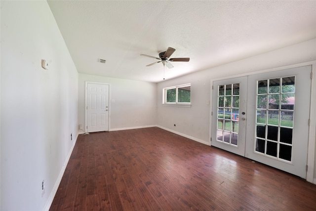 8820 Easley St, White Settlement, TX 76108 - empty room with wood finished floors, french doors, a ceiling fan, and baseboards