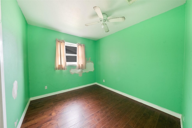 8820 Easley St, White Settlement, TX 76108 - spare room with baseboards, dark wood-type flooring, and a ceiling fan