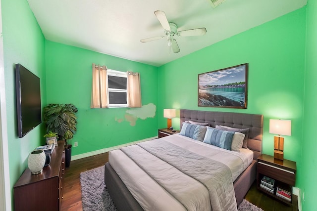 8820 Easley St, White Settlement, TX 76108 - bedroom with dark wood-style floors, ceiling fan, and baseboards