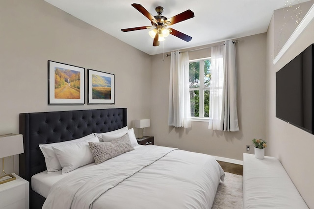 201 W Lancaster Ave Unit 218, Fort Worth, TX 76102 - bedroom featuring baseboards and ceiling fan