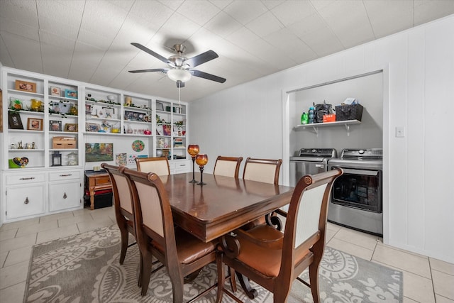 4900 Ira St, Haltom City, TX 76117 - dining space featuring washer and dryer, light tile patterned flooring, and a ceiling fan