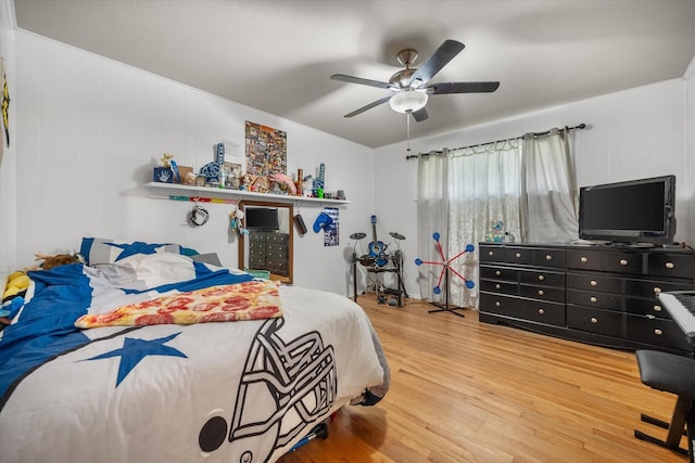 4900 Ira St, Haltom City, TX 76117 - bedroom featuring wood finished floors and ceiling fan