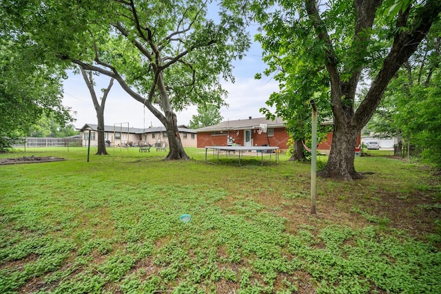 4900 Ira St, Haltom City, TX 76117 - view of yard with a trampoline
