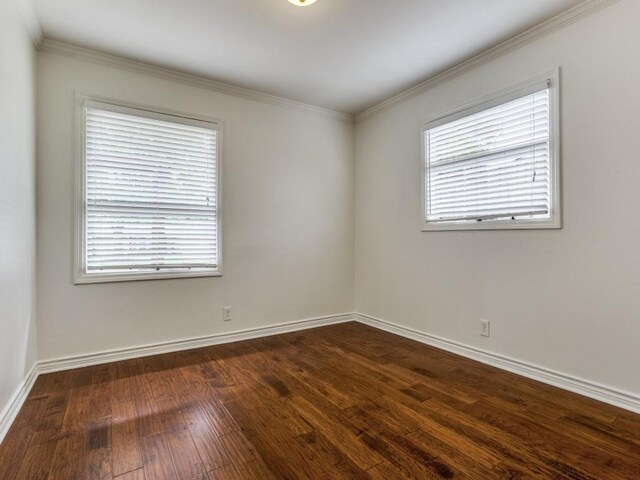 827 Sherbrook Dr, Richardson, TX 75080 - unfurnished room with dark wood finished floors, baseboards, and ornamental molding