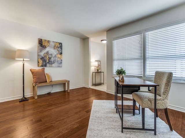 827 Sherbrook Dr, Richardson, TX 75080 - home office featuring baseboards and wood finished floors
