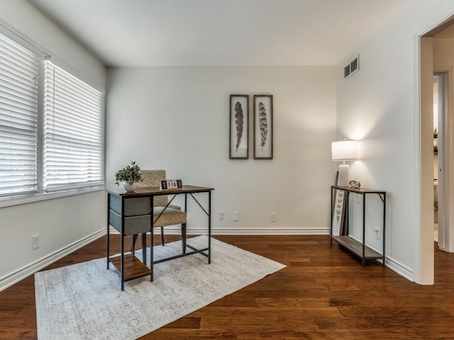 827 Sherbrook Dr, Richardson, TX 75080 - office area with wood finished floors and baseboards