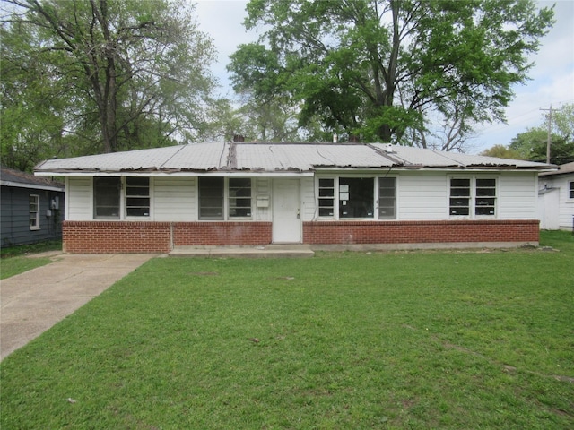 3108 Woodford St, Shreveport, LA 71108 - single story home with a front lawn and brick siding