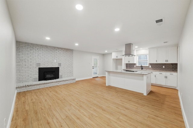 742 Chalk Hill Ln, Desoto, TX 75115 - kitchen with extractor fan, open floor plan, baseboards, white cabinets, and recessed lighting