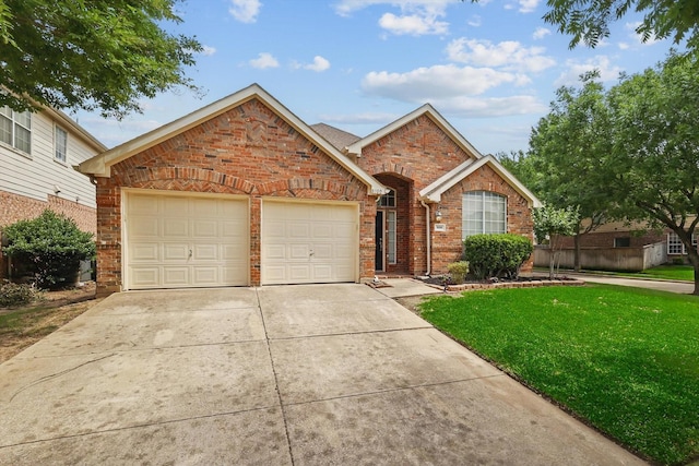 8100 Hosta Way, Fort Worth, TX 76123 - traditional-style house featuring a garage, a front lawn, driveway, and brick siding