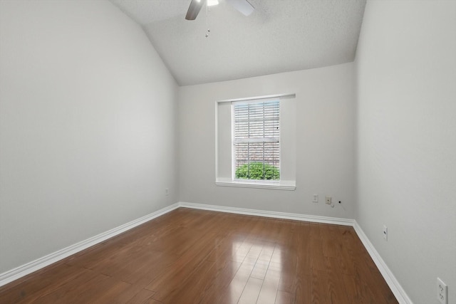 8100 Hosta Way, Fort Worth, TX 76123 - empty room with wood finished floors, vaulted ceiling, ceiling fan, and baseboards