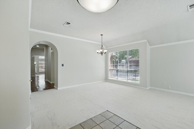 8100 Hosta Way, Fort Worth, TX 76123 - carpeted spare room with arched walkways, a chandelier, baseboards, ornamental molding, and a textured ceiling