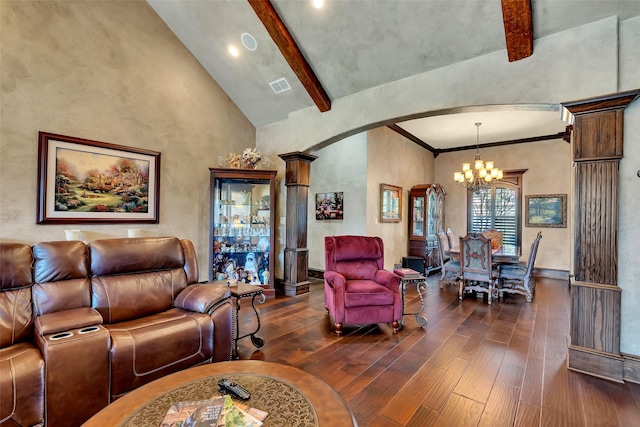 175 Rockrose Dr, Longview, TX 75605 - living area with arched walkways, dark wood finished floors, a chandelier, high vaulted ceiling, and beam ceiling