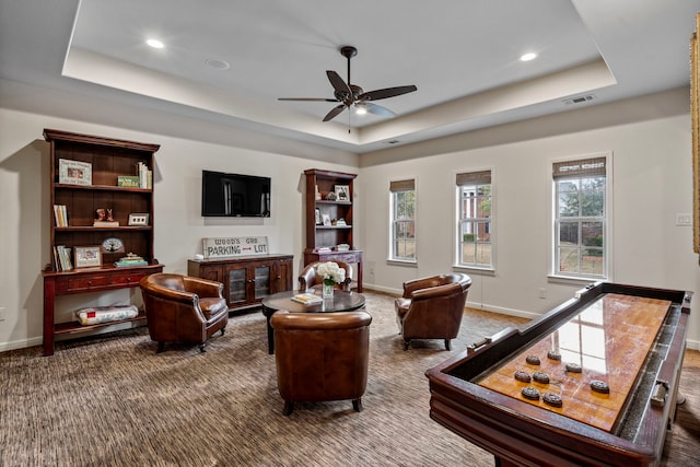 7315 Danashire Ave, Dallas, TX 75231 - living area featuring a tray ceiling, carpet flooring, ceiling fan, recessed lighting, and baseboards