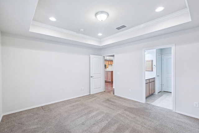 7789 Gulf Breeze Ln, Frisco, TX 75036 - unfurnished bedroom with a raised ceiling, ornamental molding, light carpet, recessed lighting, and baseboards