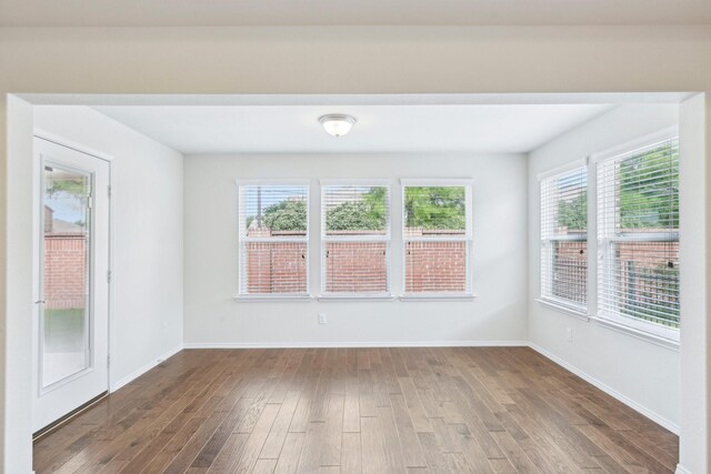 7789 Gulf Breeze Ln, Frisco, TX 75036 - empty room featuring wood finished floors and baseboards