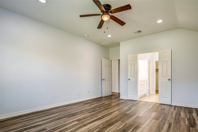 2144 Callahan Dr, Forney, TX 75126 - unfurnished bedroom with wood finished floors, recessed lighting, baseboards, ceiling fan, and lofted ceiling