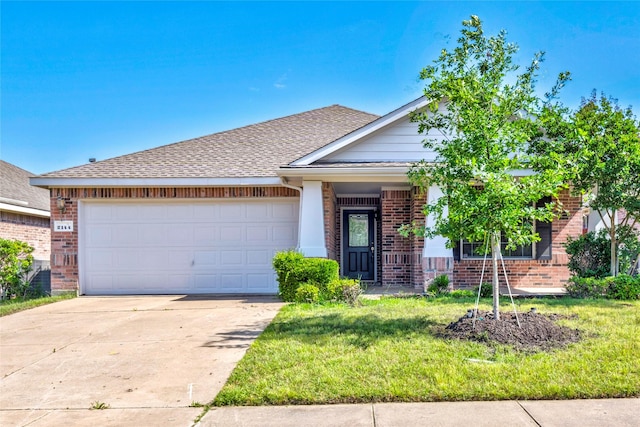 2144 Callahan Dr, Forney, TX 75126 - view of front of home with brick siding, an attached garage, driveway, and a front lawn