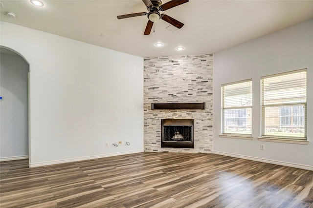2144 Callahan Dr, Forney, TX 75126 - unfurnished living room with a ceiling fan, wood finished floors, recessed lighting, baseboards, and a fireplace