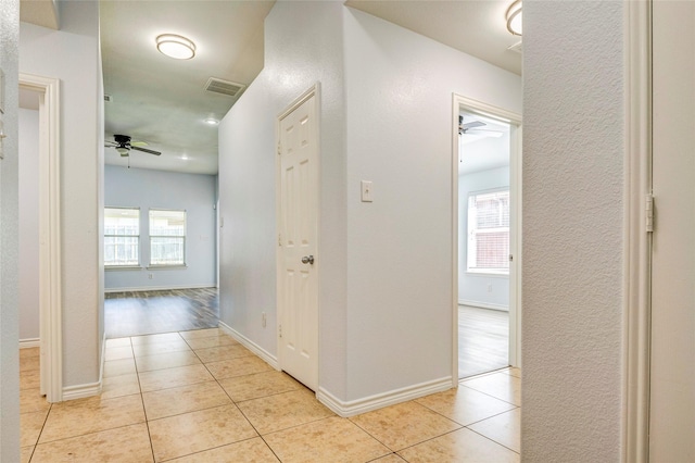 2144 Callahan Dr, Forney, TX 75126 - hall with light tile patterned floors and baseboards