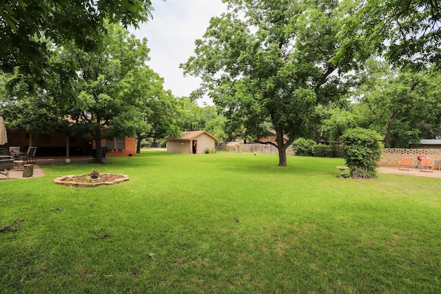 1000 S Harrison St, Mcgregor, TX 76657 - view of yard with a patio and an outdoor fire pit