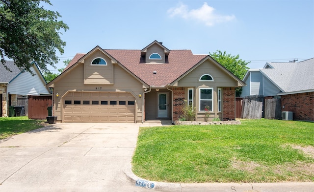 417 Red Coat Ln, Arlington, TX 76002 - view of front of house with an attached garage, concrete driveway, central air condition unit, roof with shingles, and brick siding