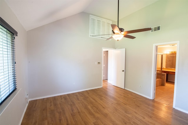 417 Red Coat Ln, Arlington, TX 76002 - unfurnished bedroom featuring high vaulted ceiling, wood finished floors, and baseboards