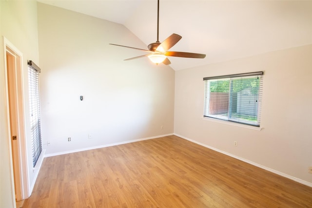 417 Red Coat Ln, Arlington, TX 76002 - unfurnished room featuring lofted ceiling, a ceiling fan, light wood-style flooring, and baseboards
