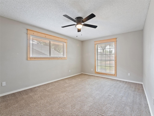 4509 Trowbridge Dr, Arlington, TX 76013 - carpeted empty room featuring ceiling fan, baseboards, and a textured ceiling
