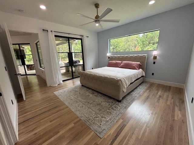 5073 Loper Cir, Streetman, TX 75859 - bedroom with baseboards, wood finished floors, recessed lighting, and ceiling fan