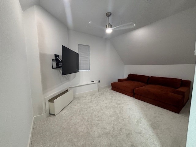 5073 Loper Cir, Streetman, TX 75859 - carpeted living area with a ceiling fan, vaulted ceiling, and baseboards