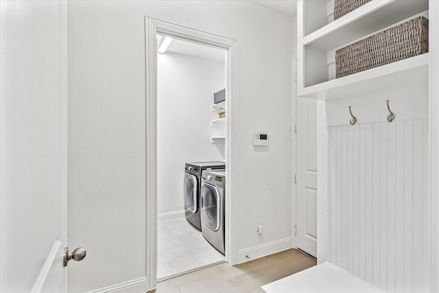 806 Placid Way, Argyle, TX 76226 - laundry area featuring washing machine and clothes dryer and light wood-type flooring